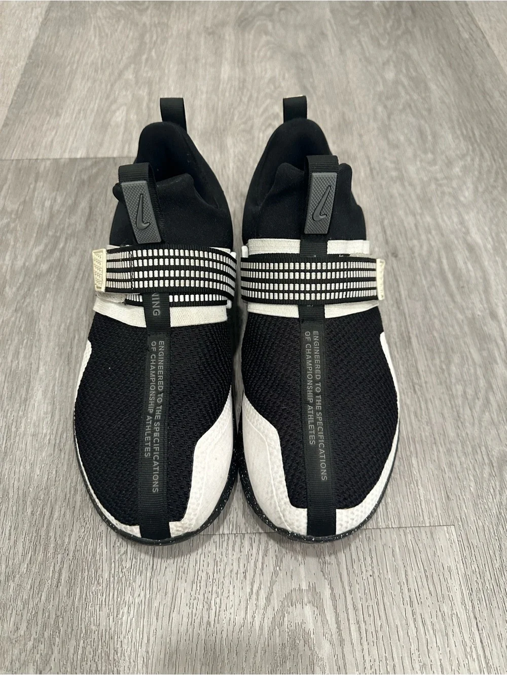 Nike Black and White Slip-On Athletic Sneakers